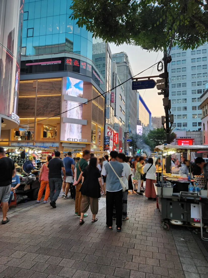 Myeongdong shopping street in Seoul, a neighbourhood base for an early-arrival day